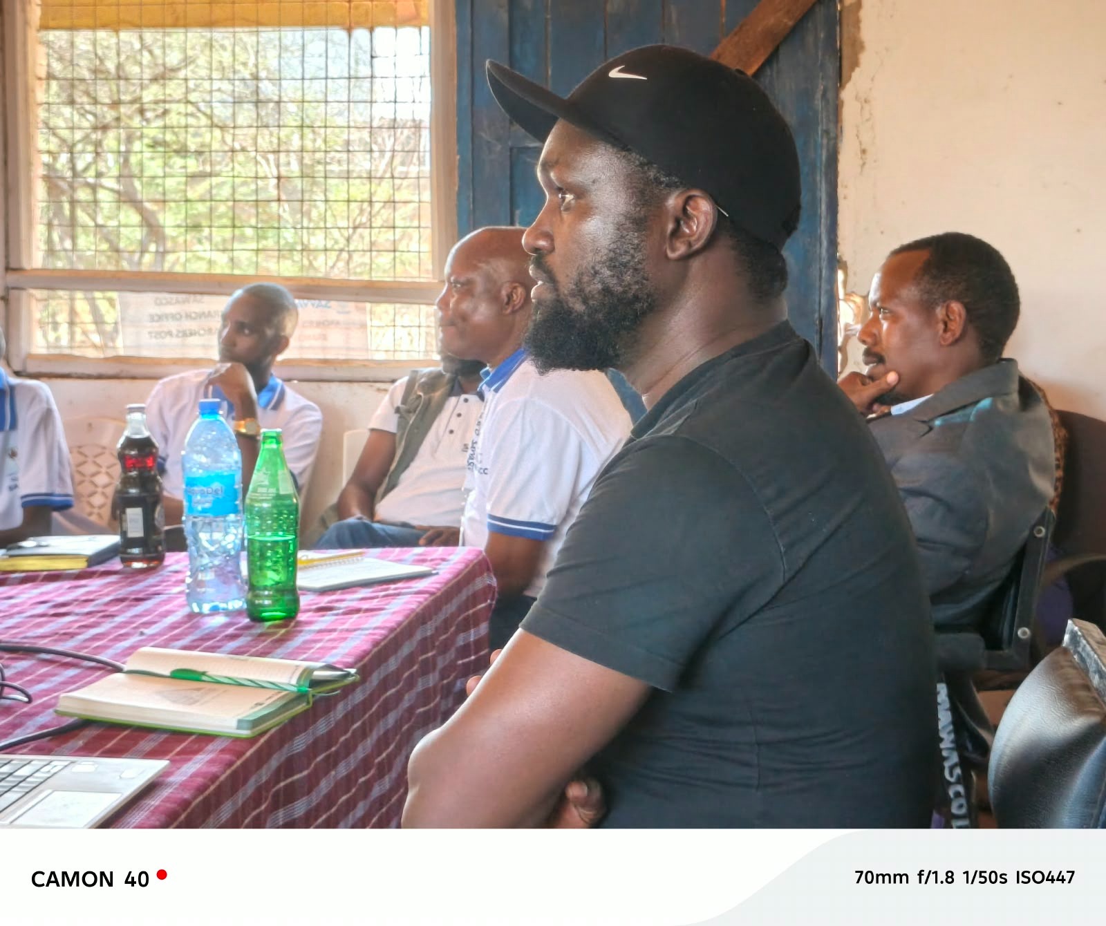 Community members giving feedback in Archers Post